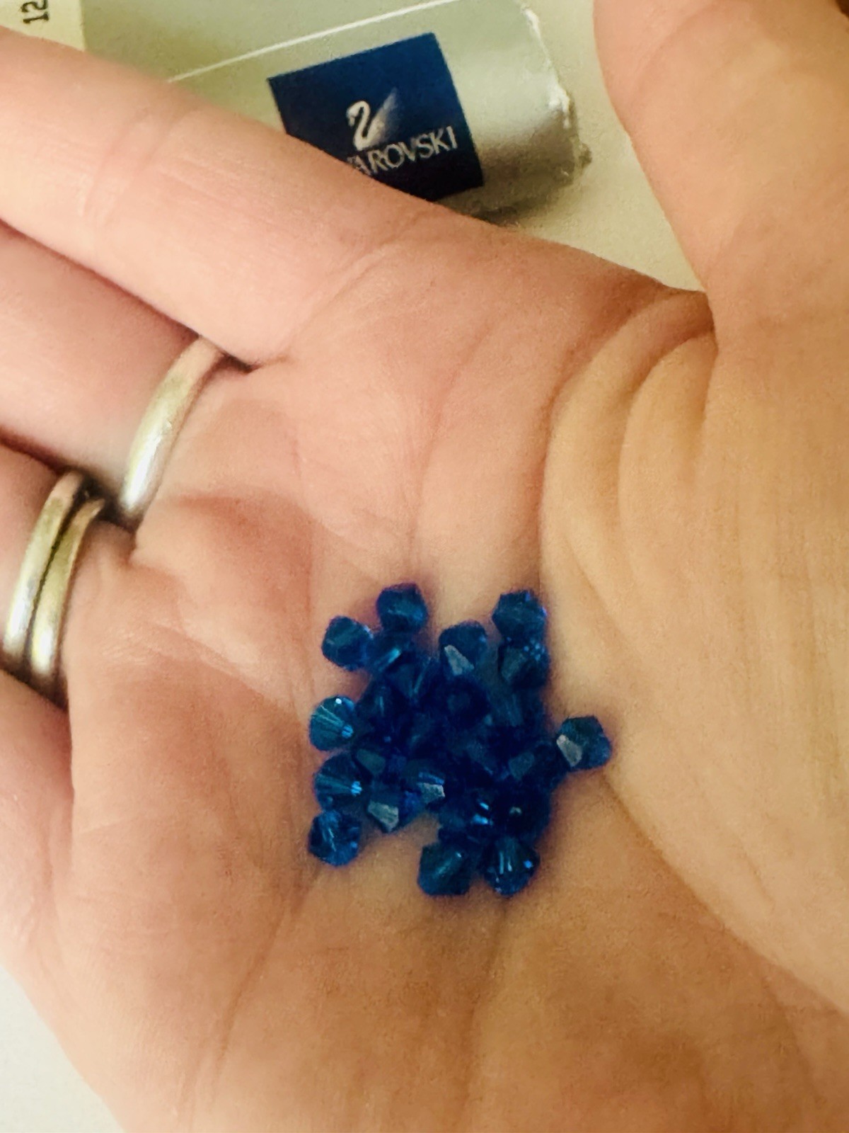 24 pieces Genuine Austrian Swarovski Crystal 4mm Bicone Beads Capri Blue #5301