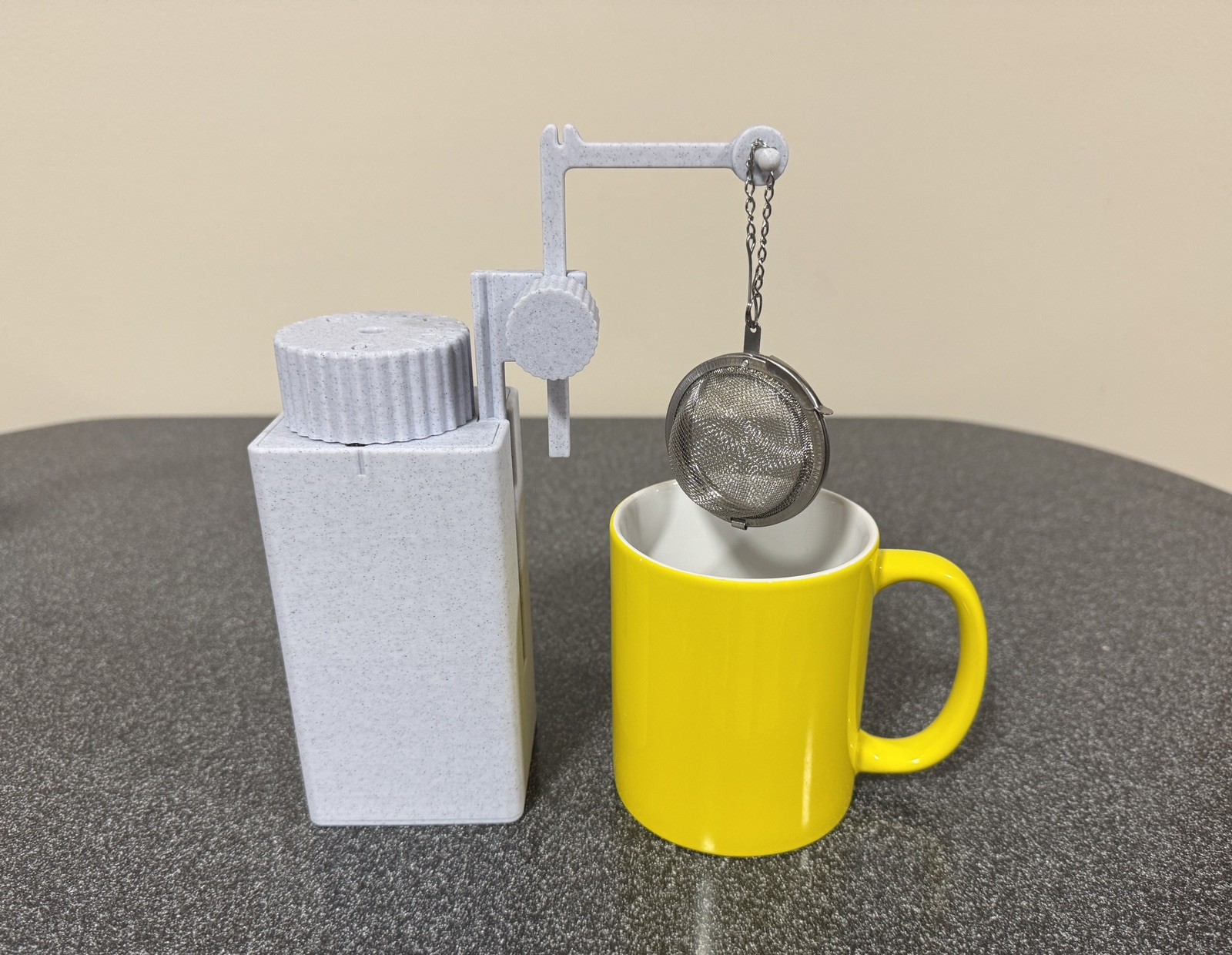 Tea timer with tea bag lifter. Patent pending, made in USA.
