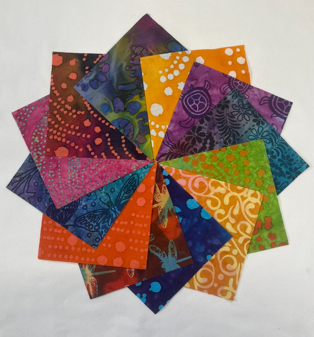 Mixed Batik Prints ~ 42 5″ Squares ~ Charm Pack of Batiks