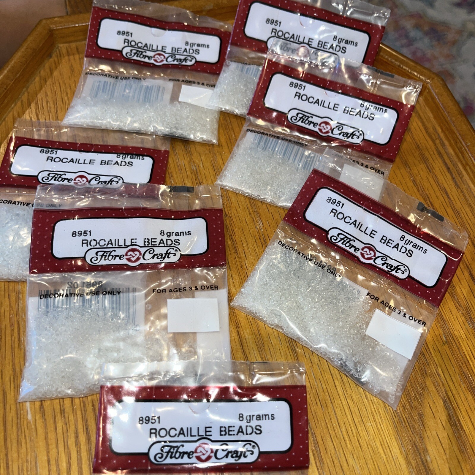 fibre craft Rocaille Beads # 8951 clear -7 bags each bag 8 grams