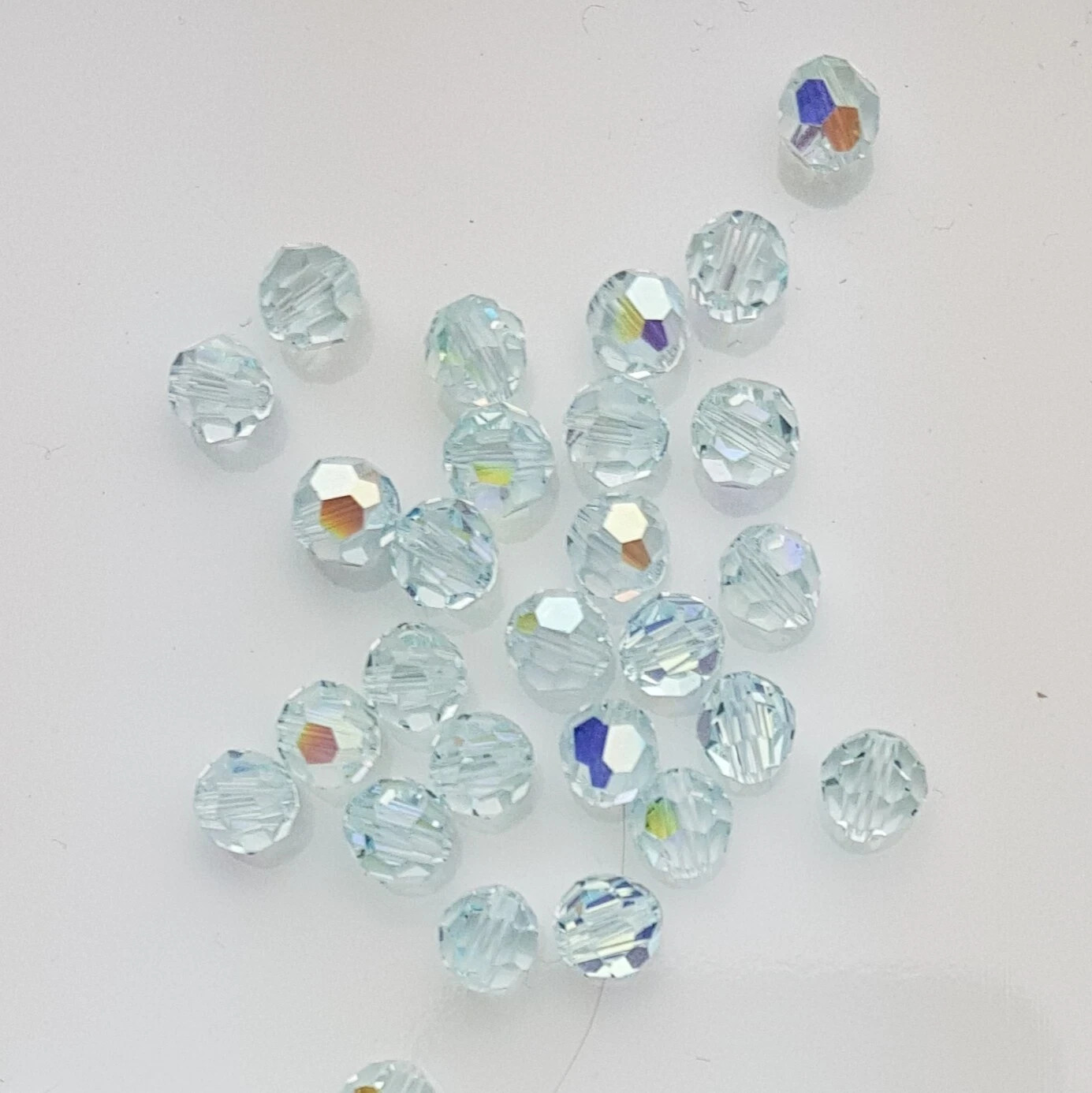144x Swarovski 5000 Crystal AB 6mm Bicone Beads – Genuine Xilion Cut Bulk Pack