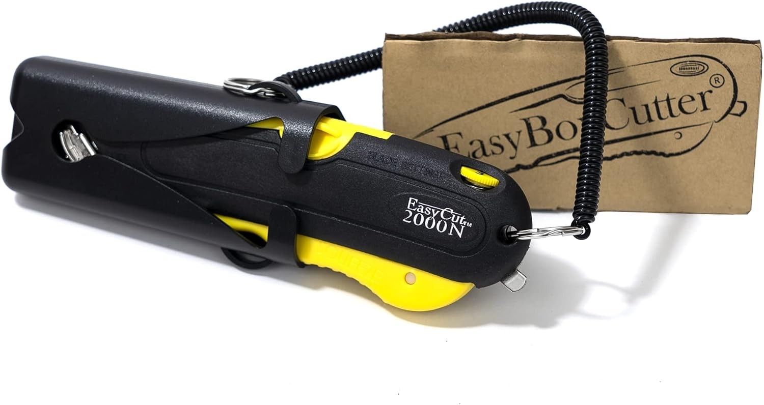 Modern Box Cutter, extra tape cutter at back Easy Cut 2000N 2 blades and holster