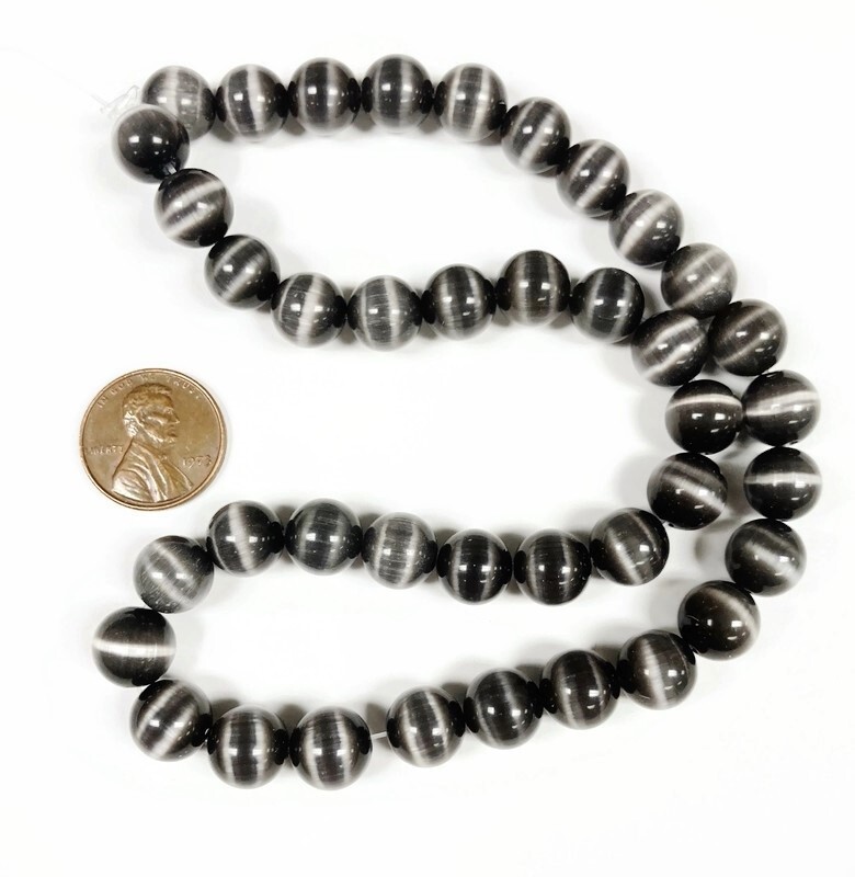 38 Cat’s Eye Fiber Optic Glass Charcoal 10mm. Smooth Round Beads 2611