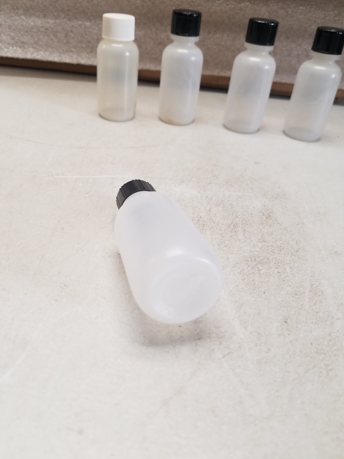 Lot of 5 – 1 oz Plastic Bottles (D)