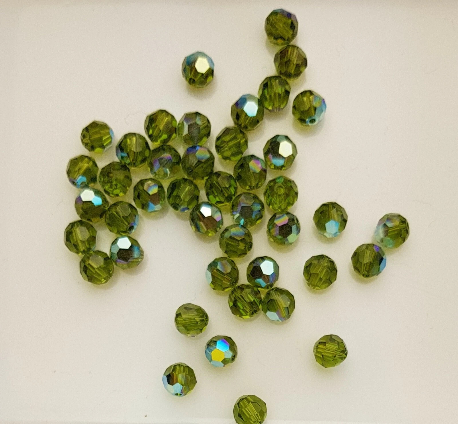 144x Swarovski 5000 Crystal AB 6mm Bicone Beads – Genuine Xilion Cut Bulk Pack