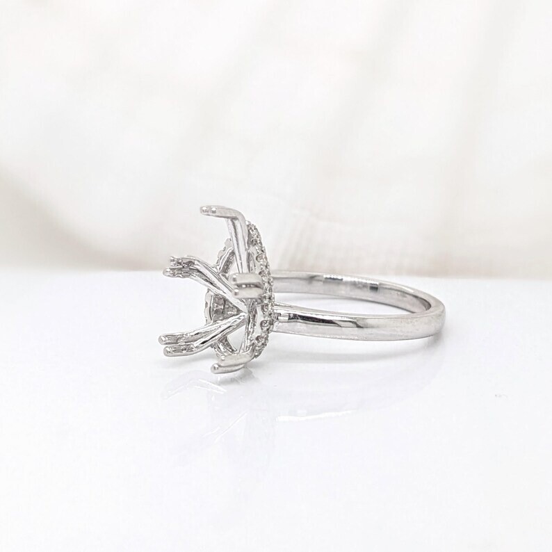 Hidden Halo Ring Semi Mount w Earth Mined Diamonds in 6×9 MM Pear Shape Ring.