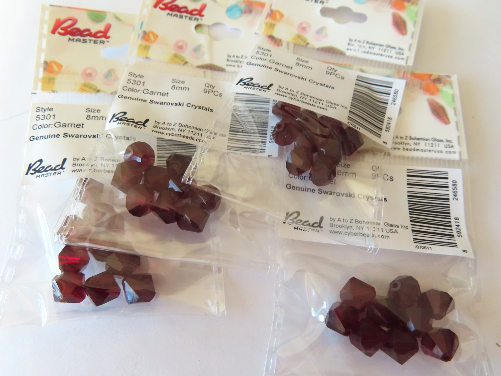 36 Swarovski Bicone Beads in 8mm Garnet. #5301
