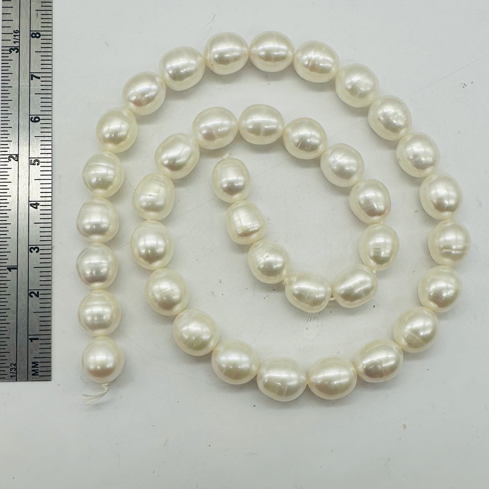 White Pear Shaped Fresh Water Pearls 16″ Strand | 12×10 to 10x9mm |