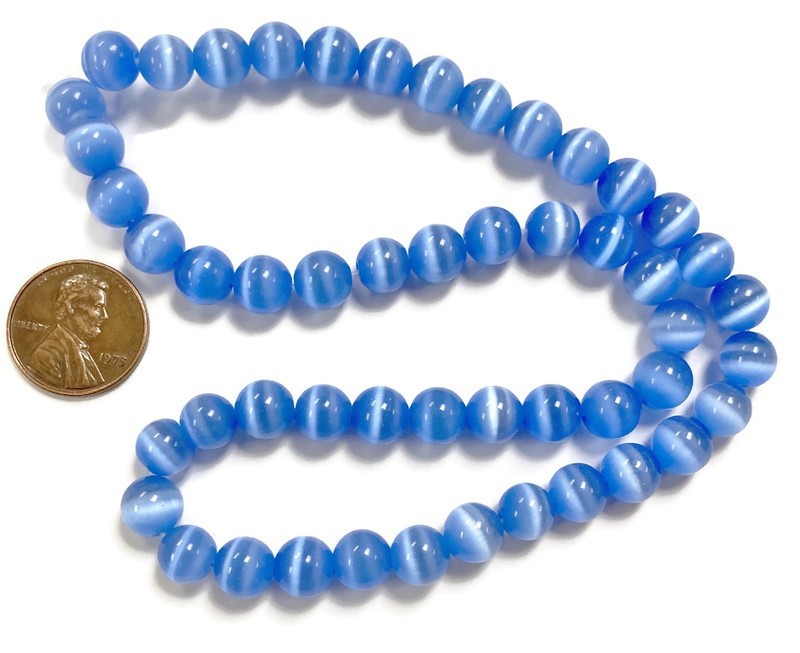 50 Cat’s Eye Fiber Optic Glass Muted Light Sapphire 8mm. Smooth Round Beads 2576