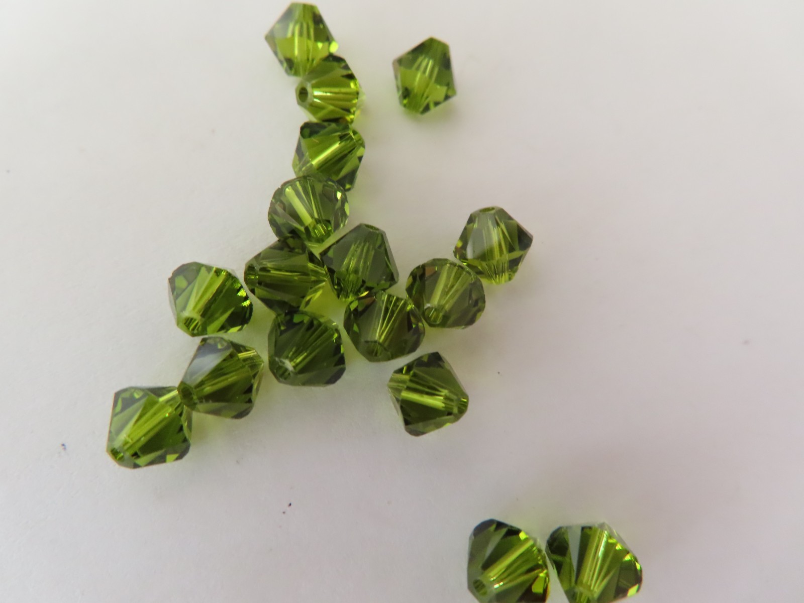 18 Swarovski Bicone Beads 6mm Olivine. #5328