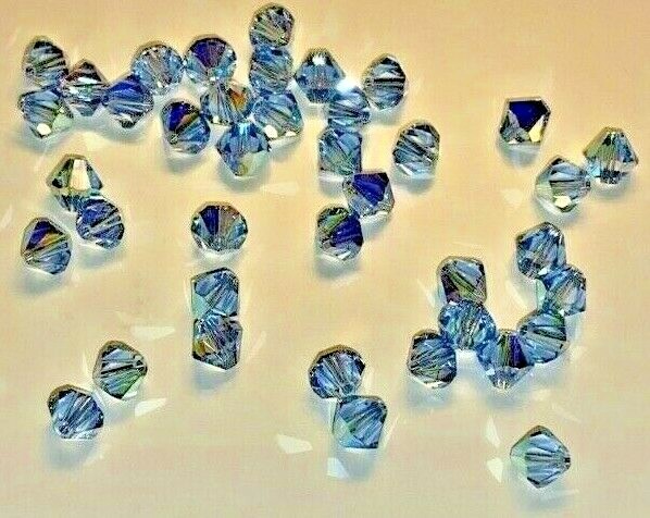 LOT 40 Swarovski 4mm Bicone Light Sapphire AB Crystals