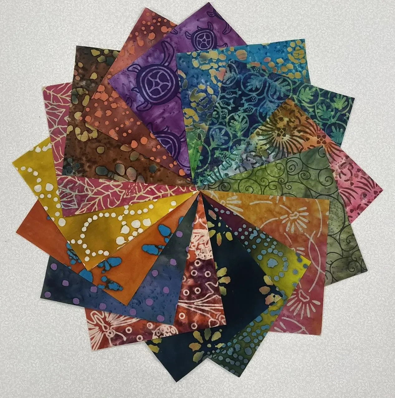 Mixed Batik Prints ~ 42 5″ Squares ~ Charm Pack of Batiks