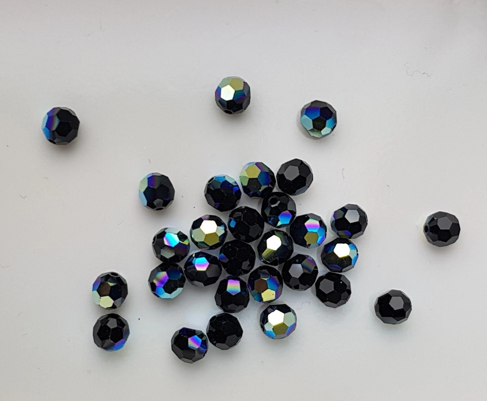 144x Swarovski 5000 Crystal AB 6mm Bicone Beads – Genuine Xilion Cut Bulk Pack