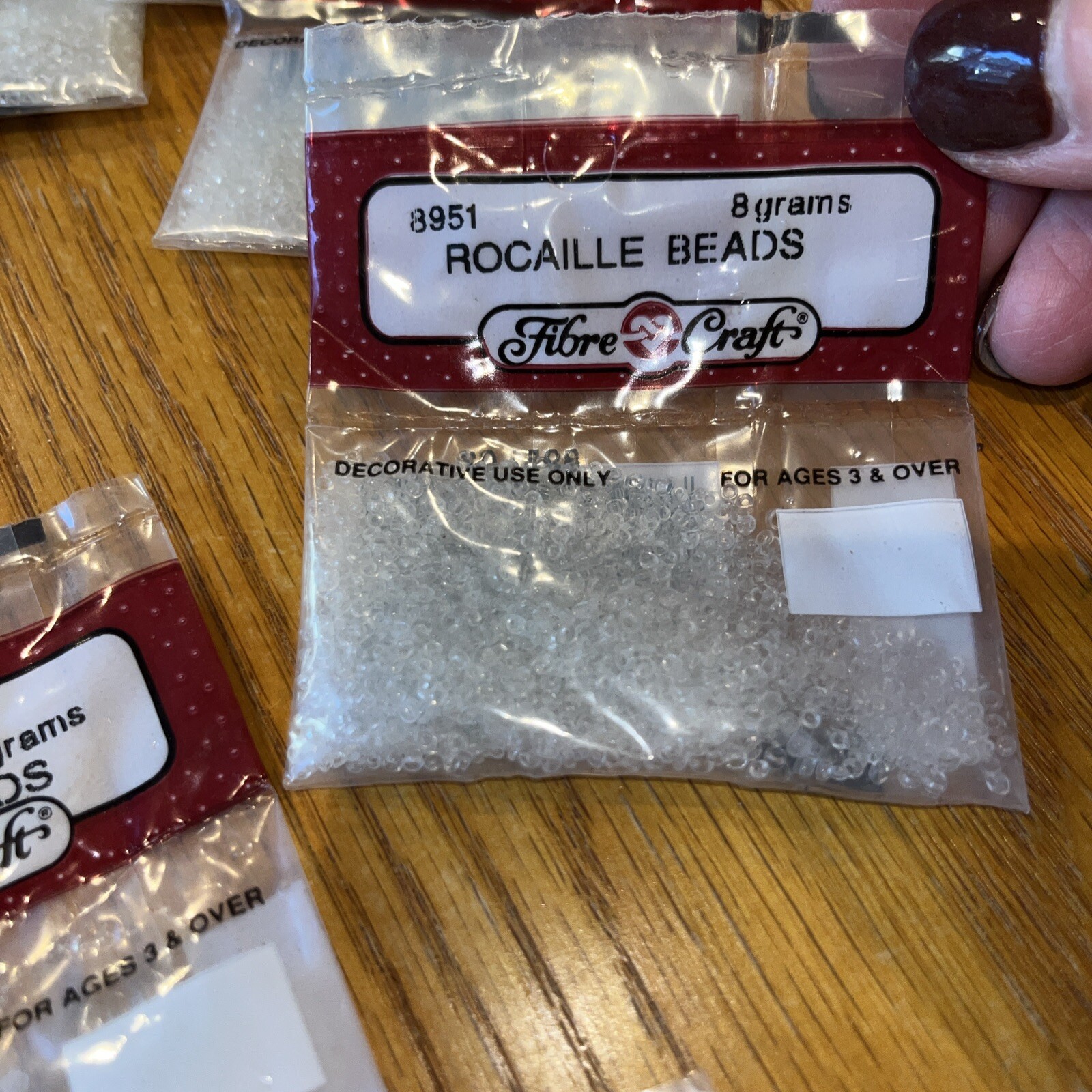 fibre craft Rocaille Beads # 8951 clear -7 bags each bag 8 grams