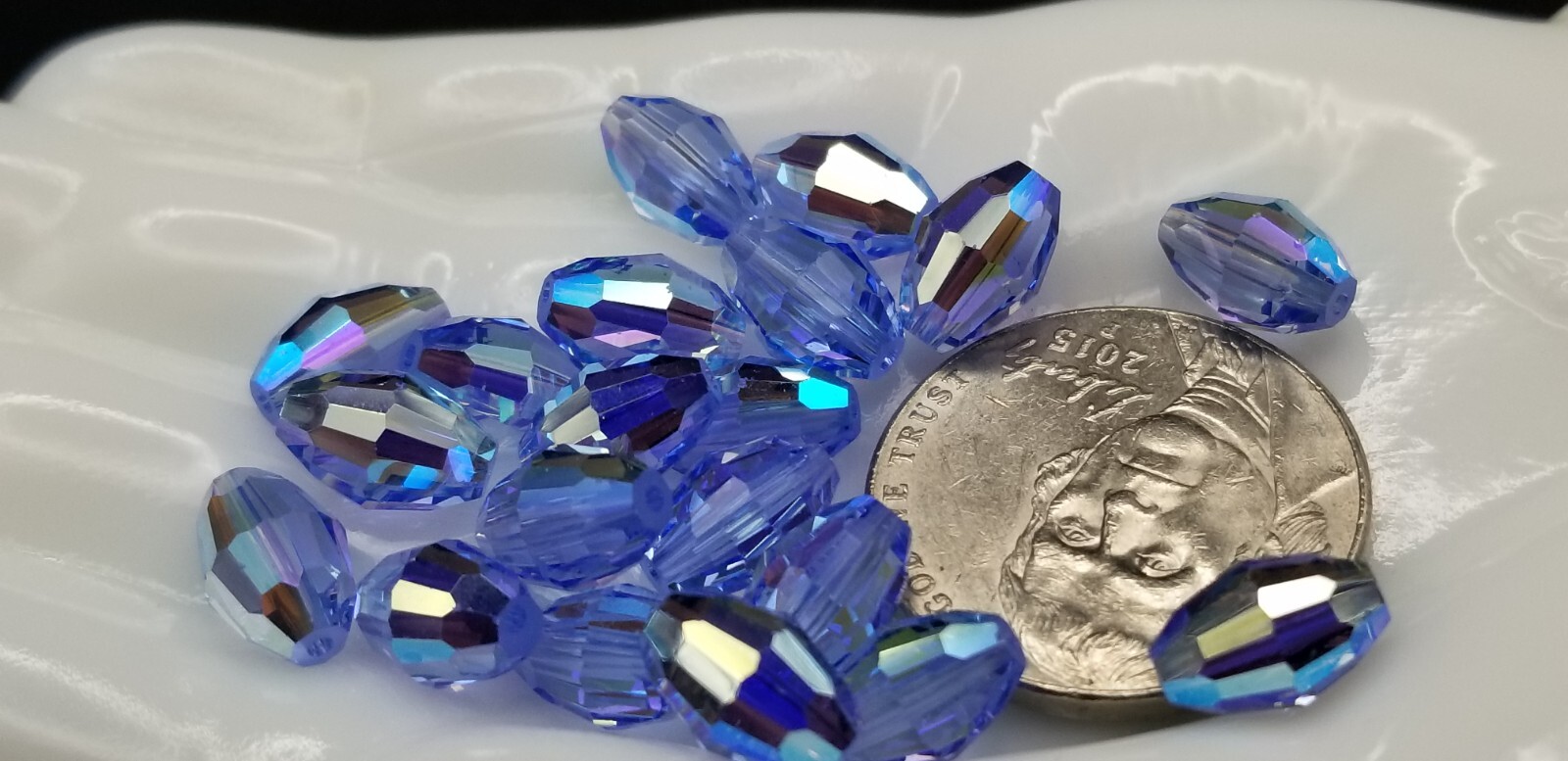 5200 Swarovski® Light Sapphire AB 9x6mm Barrel shaped oval bead 12 pieces/pk