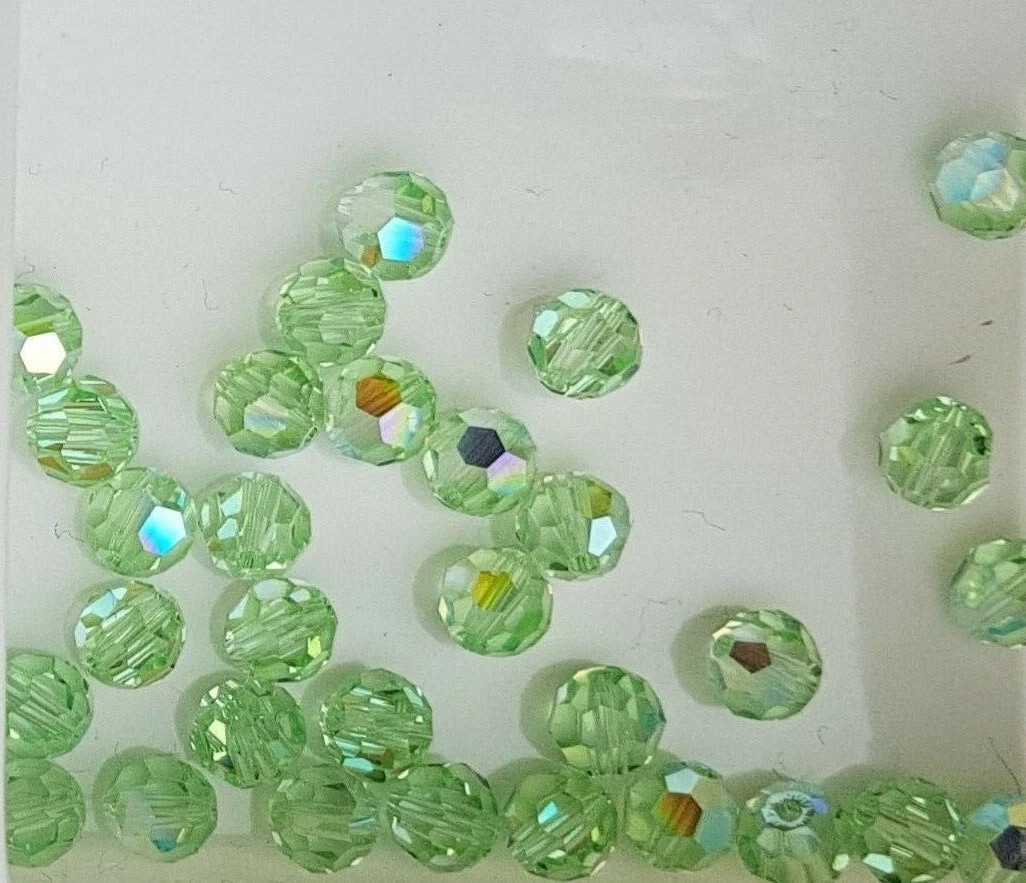 144x Swarovski 5000 Crystal AB 6mm Bicone Beads – Genuine Xilion Cut Bulk Pack