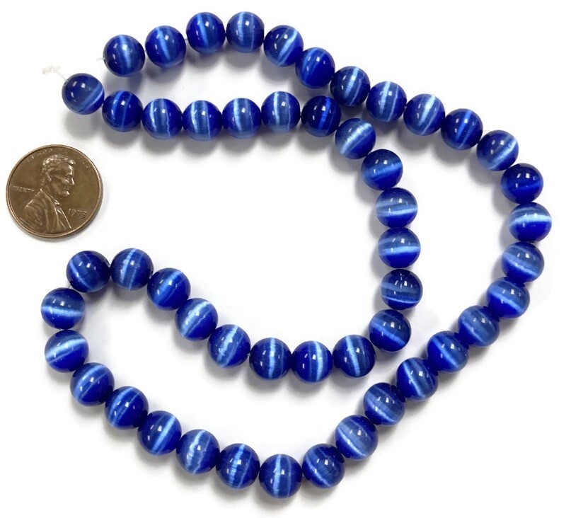 50 Cat’s Eye Fiber Optic Glass Sapphire 8mm. Smooth Round Beads 2580