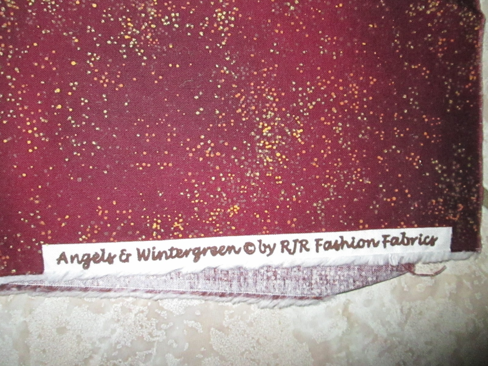 R J R Cotton Quilt Fabric – Angels & Wintergreen Dark red – 27″