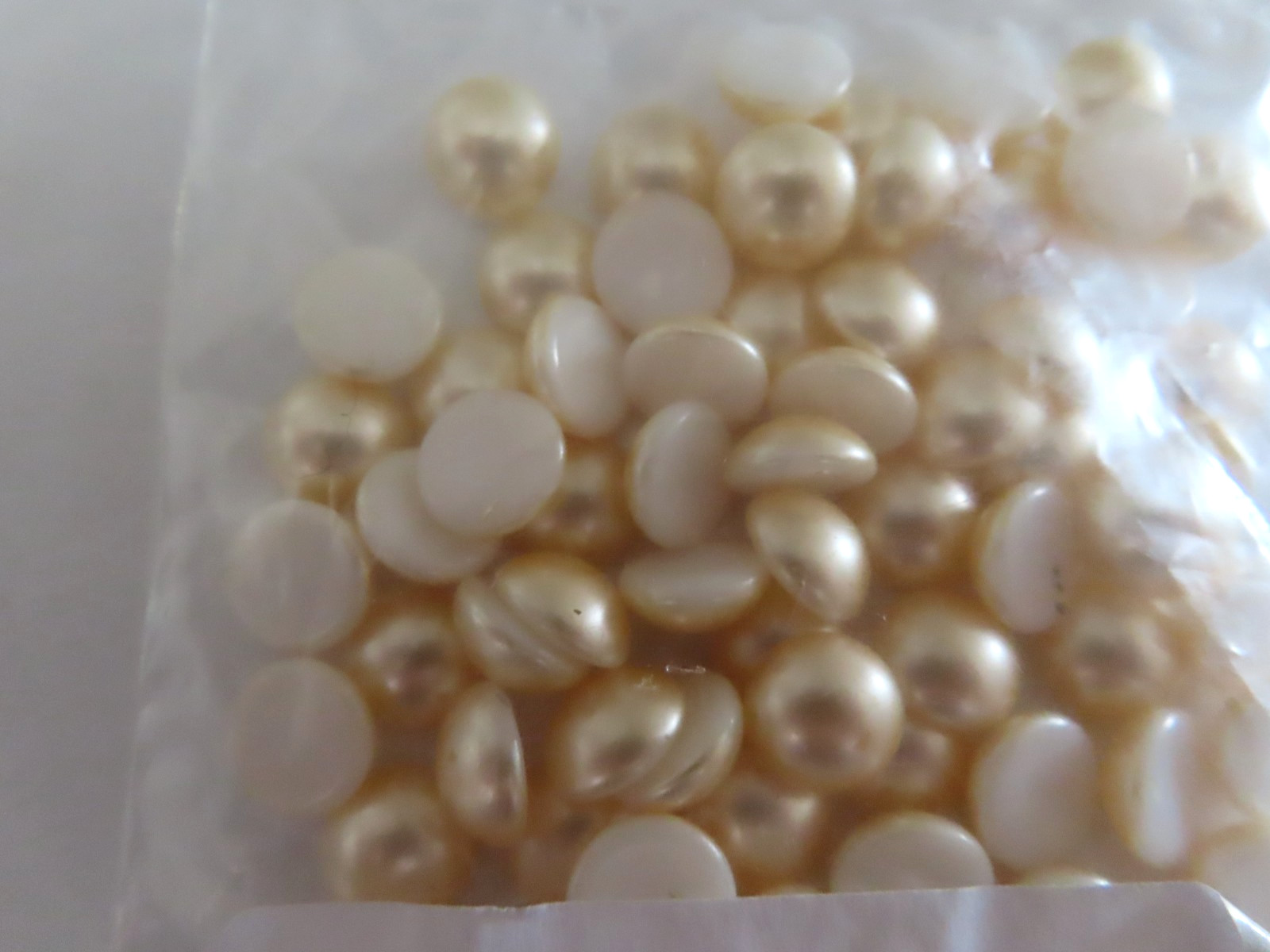 72 Czech. Glass round cabochones 11mm creamrose.