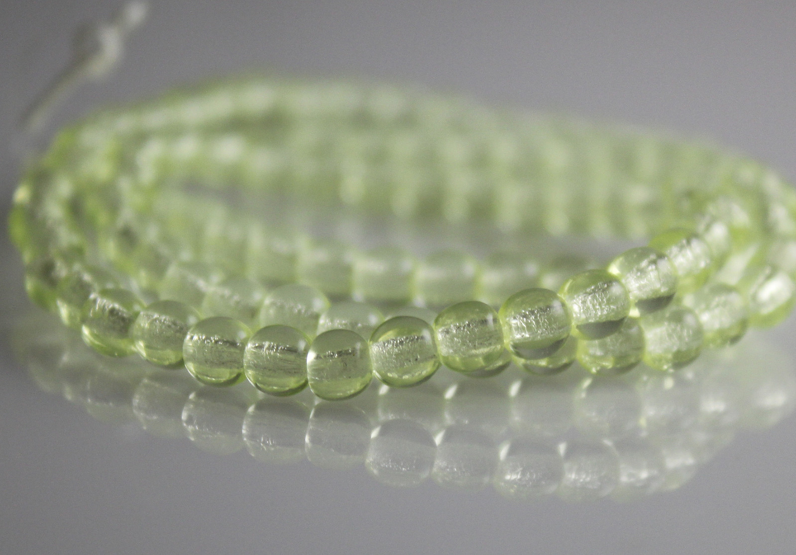Jonquil Yellow Transparent – 100 4mm Round Pressed Czech Glass Druk Beads