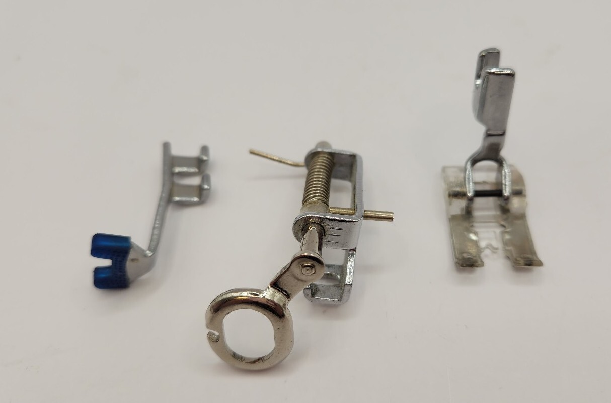 Bundle of 8 Sewing Machine Foot Parts–None Marked