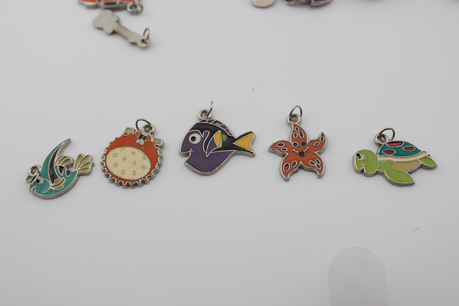 Lot of metal and enamel charms cats dogs instruments fish cars sandals 10.7 oz