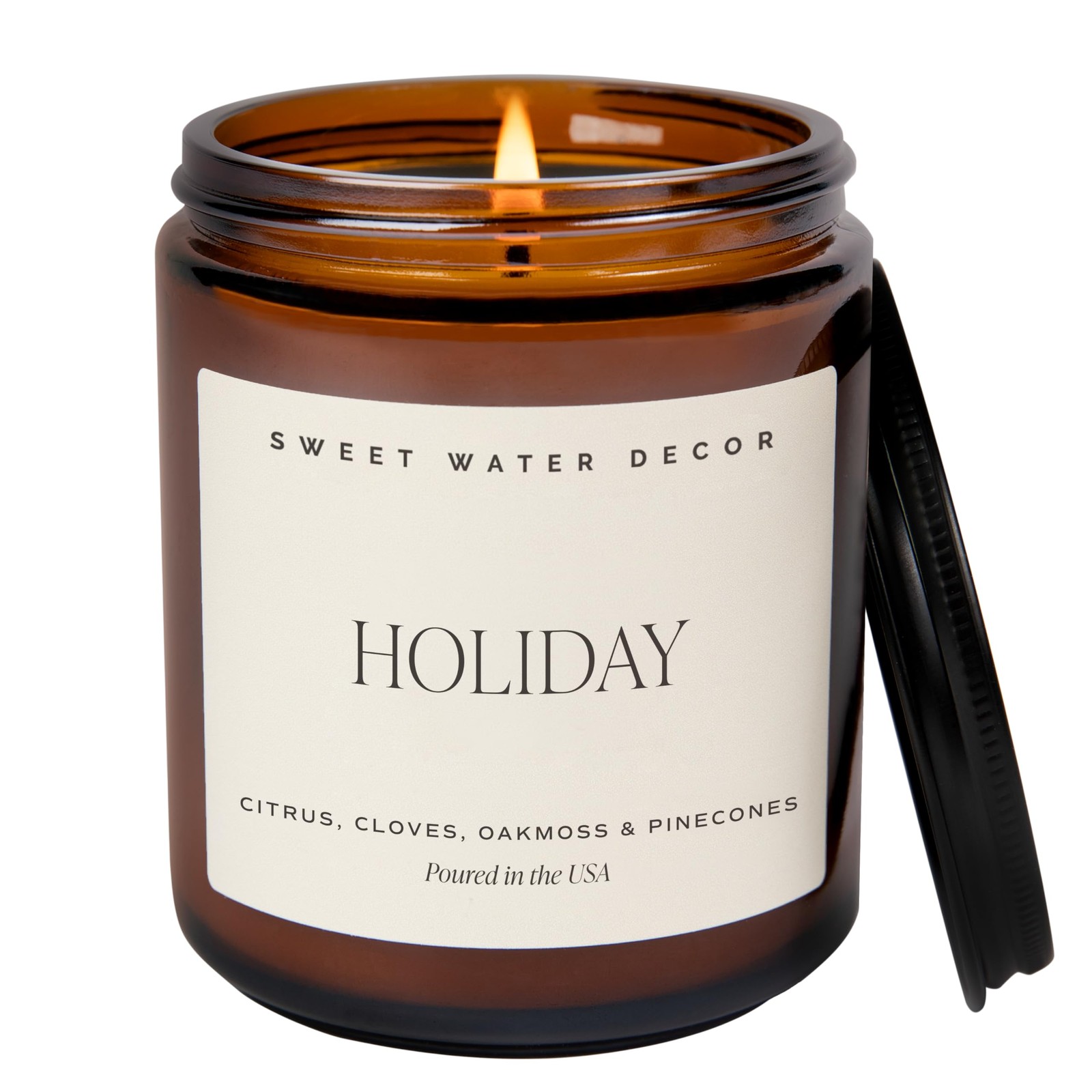 Sweet Water Decor Holiday Candle | Cloves, Pine, and Tan Label, Amber/Black