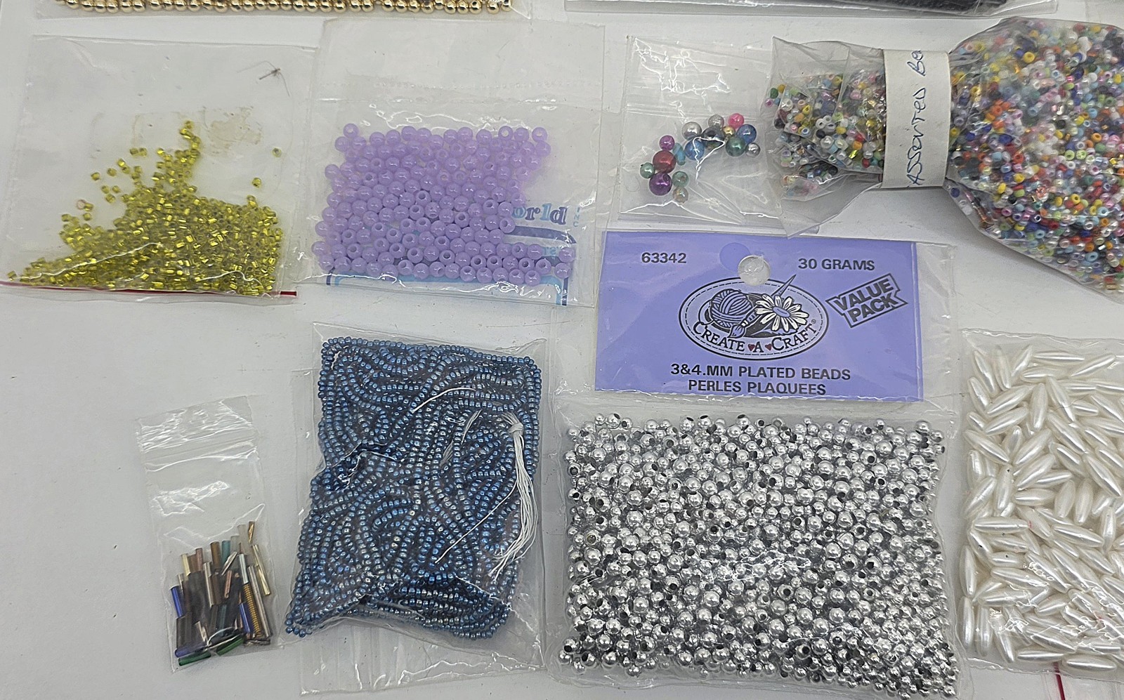 Seed Bead Lot Mixed Sizes, Colors & Materials, 33 packs 2.3 Lbs