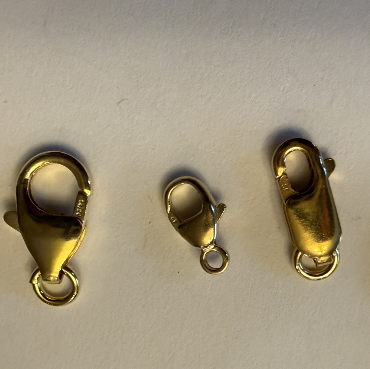 14kt Gold filled Assorted sizes lobster clasps. 16 pcs total.
