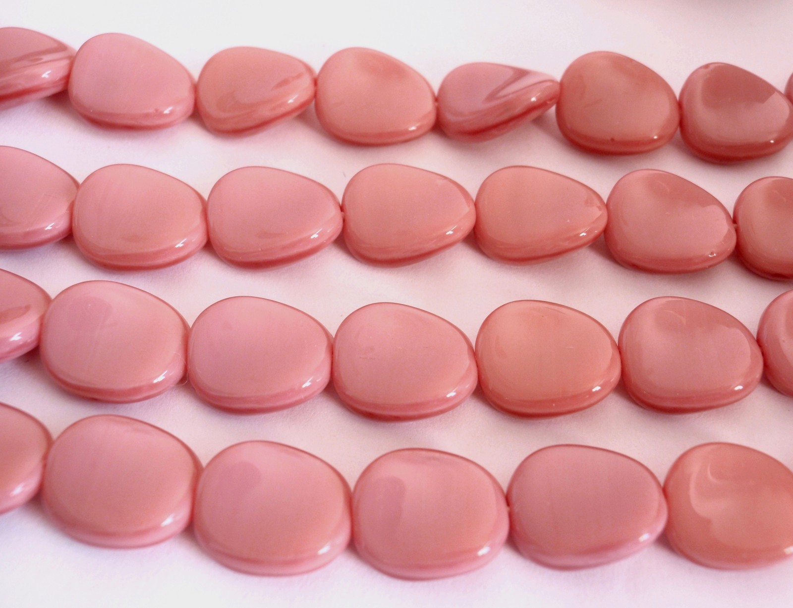 25 12×9 mm Czech Glass Twisted Flat Ovals: Opaque Pink