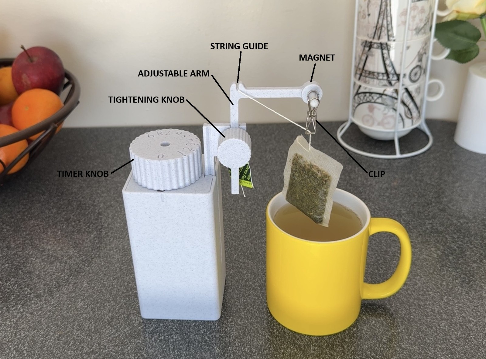 Tea timer with tea bag lifter. Patent pending, made in USA.