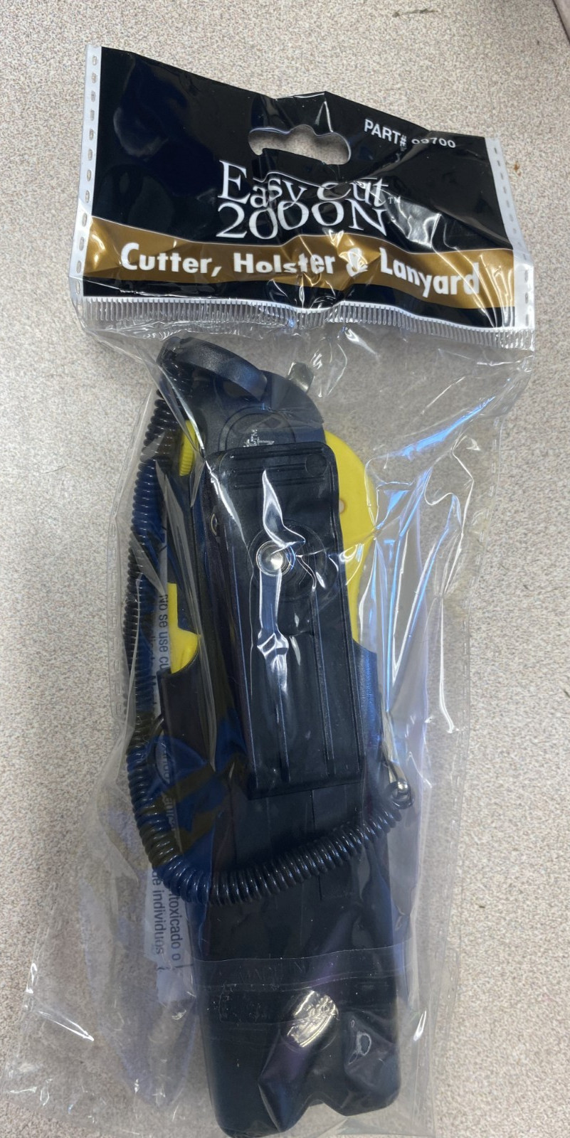 Modern Box Cutter, extra tape cutter at back Easy Cut 2000N 2 blades and holster