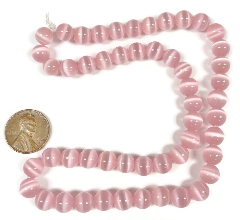 50 Cat’s Eye Fiber Optic Glass Light Pink 8mm. Smooth Round Beads 2583