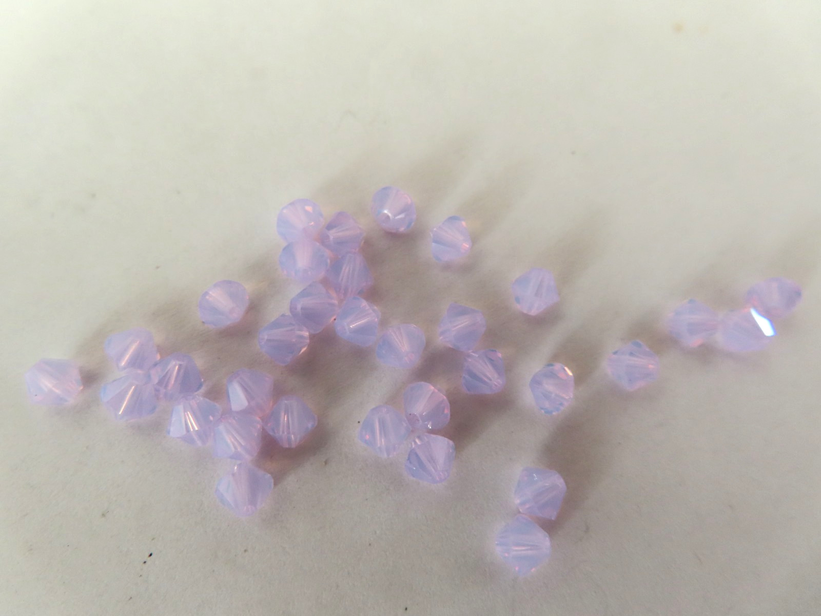 18 Swarovski Bicone Beads 6mm Violet Opal. #5328