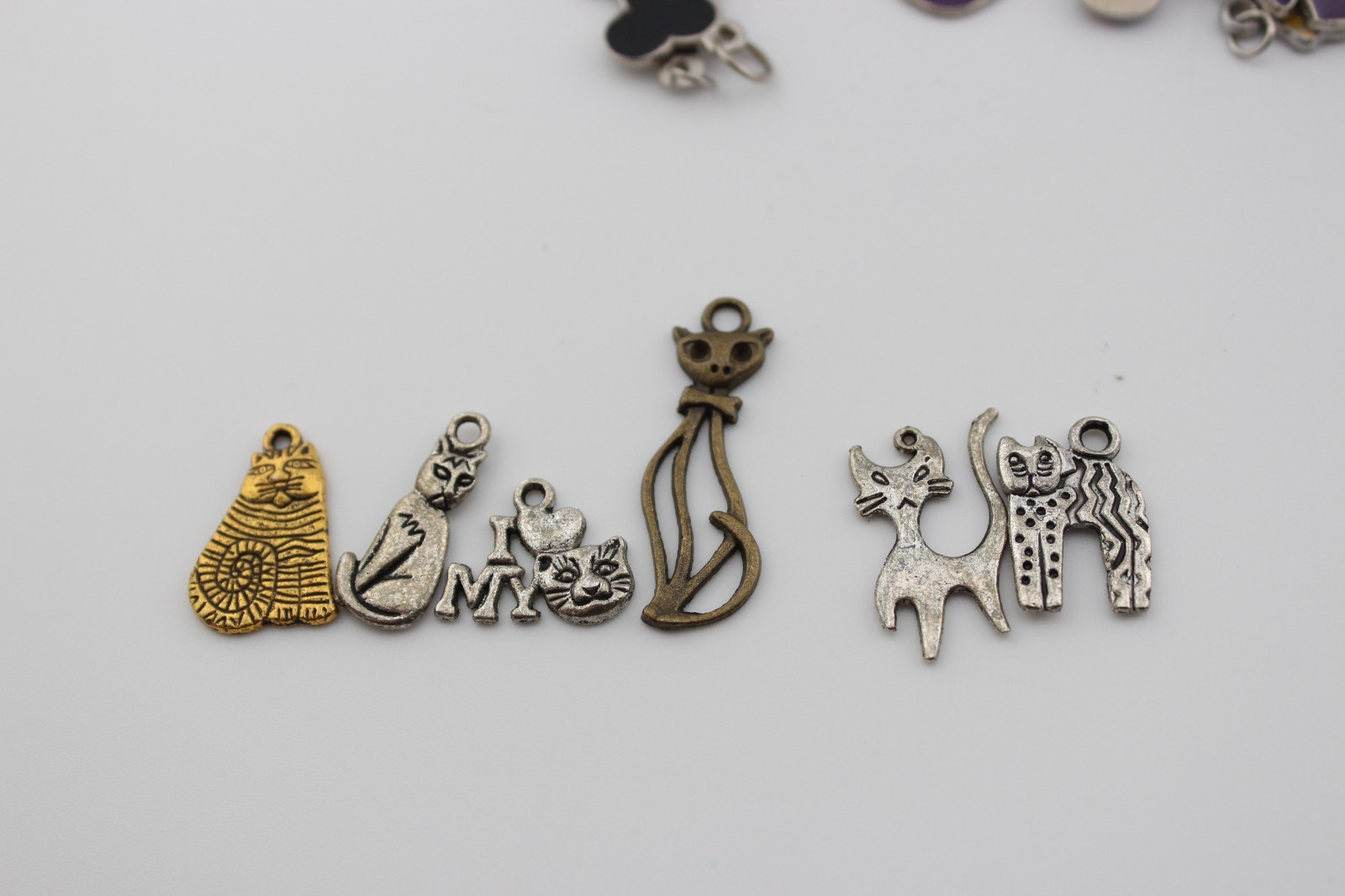Lot of metal and enamel charms cats dogs instruments fish cars sandals 10.7 oz