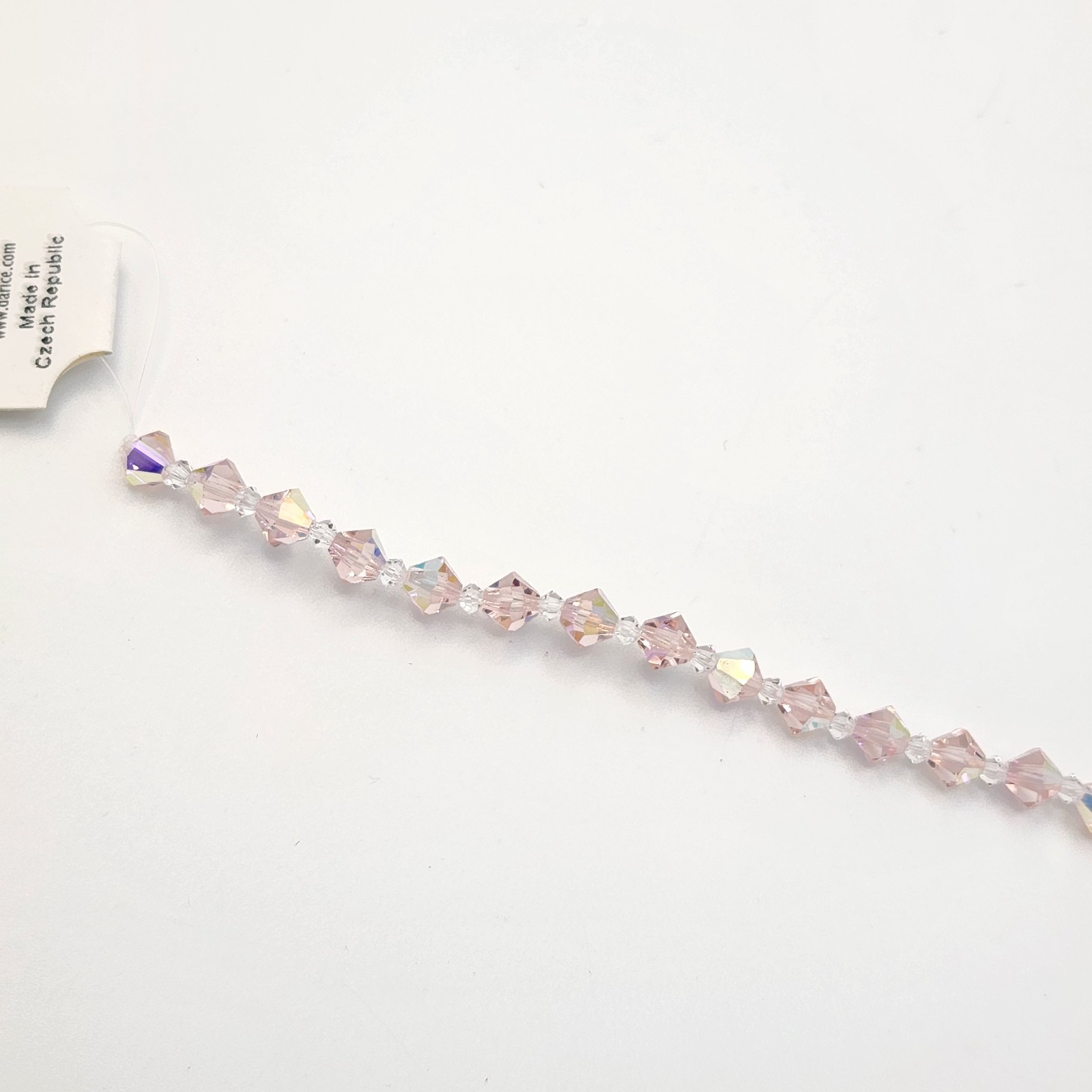 Preciosa Crystal Bead Strand by Darice Rose Pink Iridescent Round Faceted