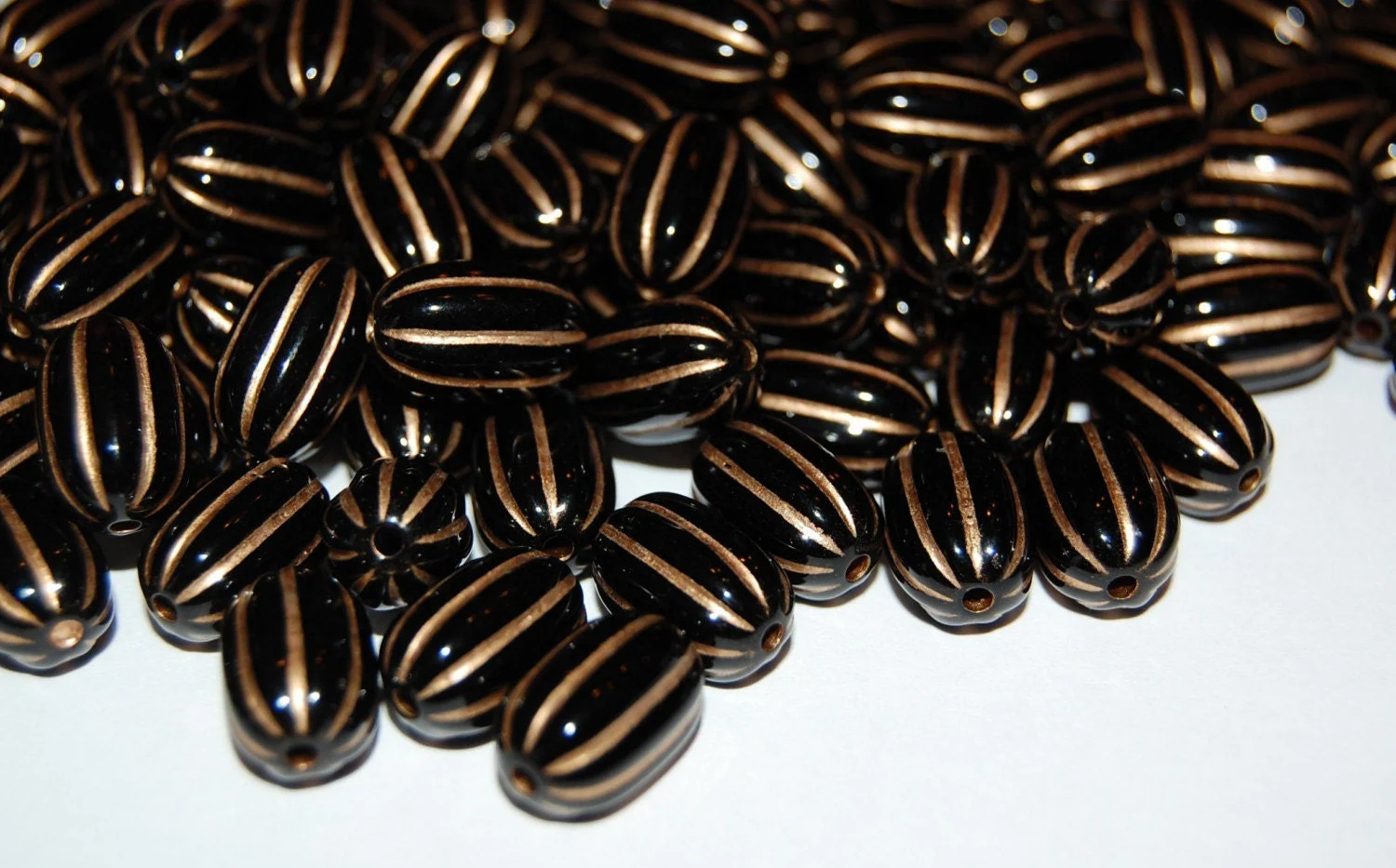 Acrylic Black and Gold Oval Ribbed Melon Beads bds465A