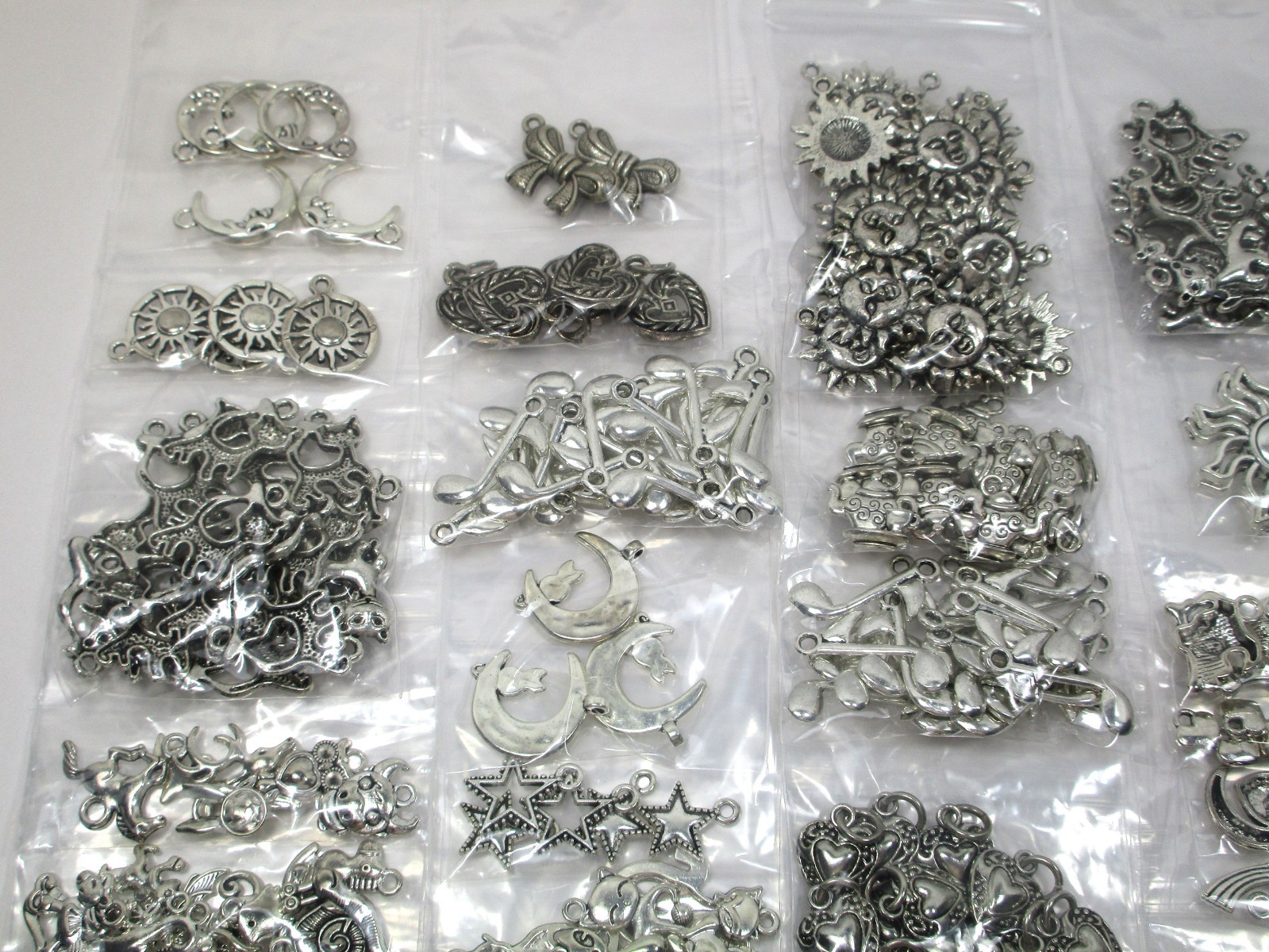 Bulk Lot – Jewelry Making Supplies – 1-1/2 lbs. Charms – Silver Tone – unused