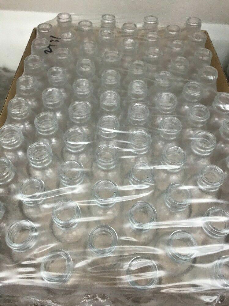 288 1 OZ 30ML CLEAR BOSTON ROUND GLASS BOTTLES WITH CLOSED CONED CAPS