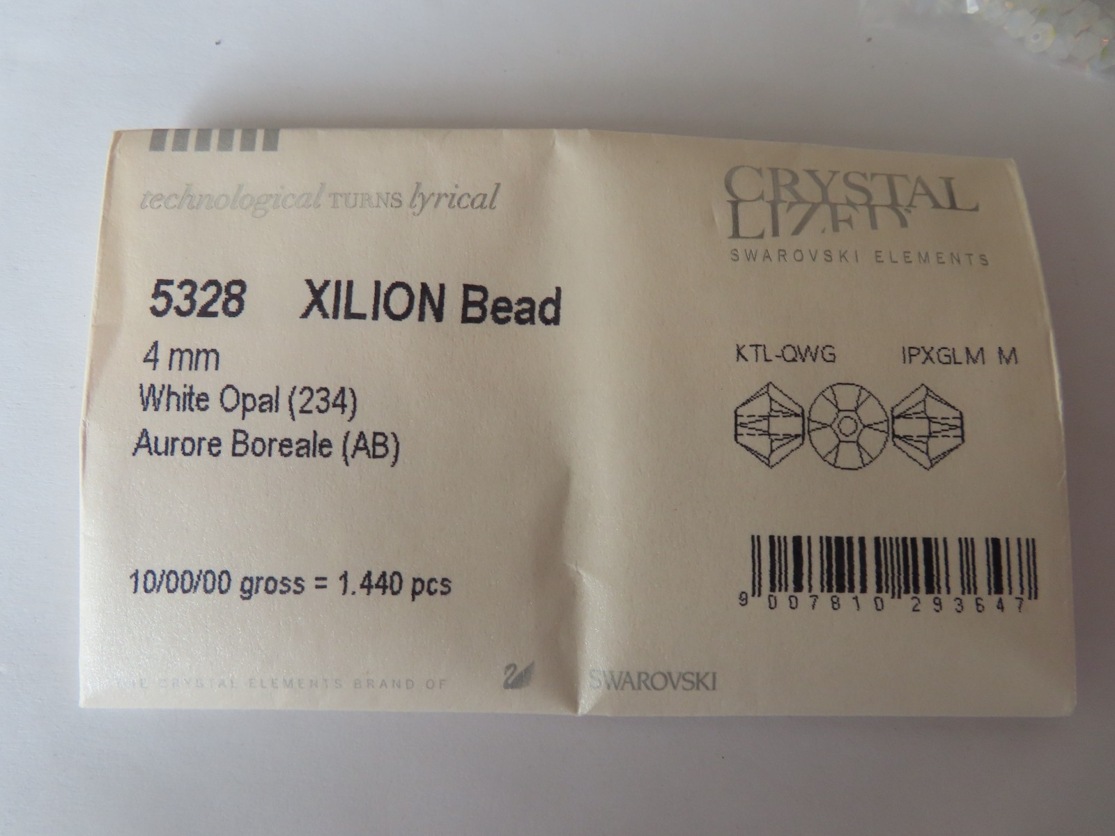 36 Swarovski Bicone Beads 4mm White Opal AB. #5328