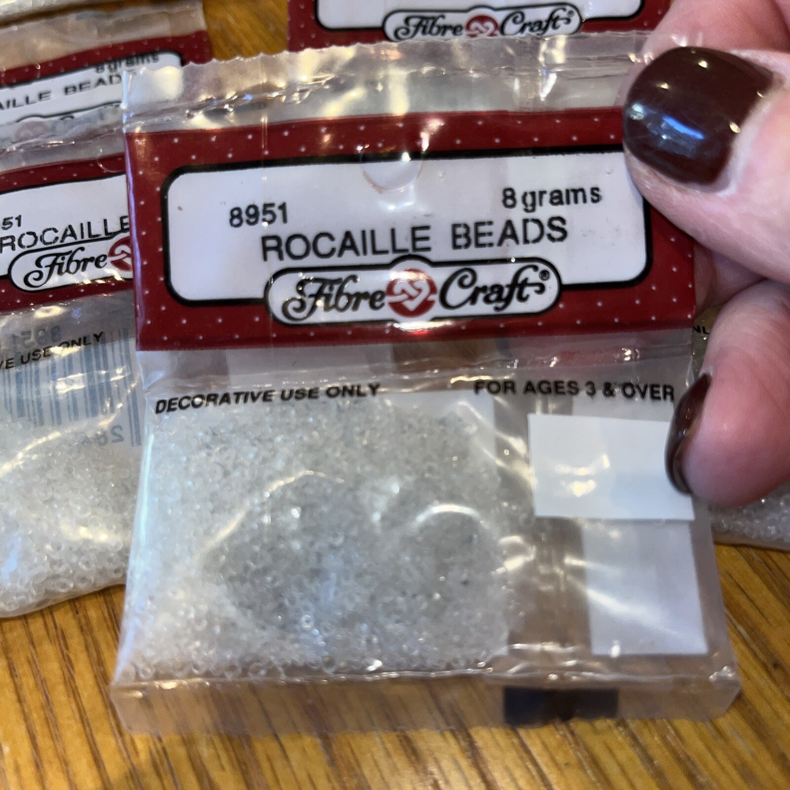 fibre craft Rocaille Beads # 8951 clear -7 bags each bag 8 grams