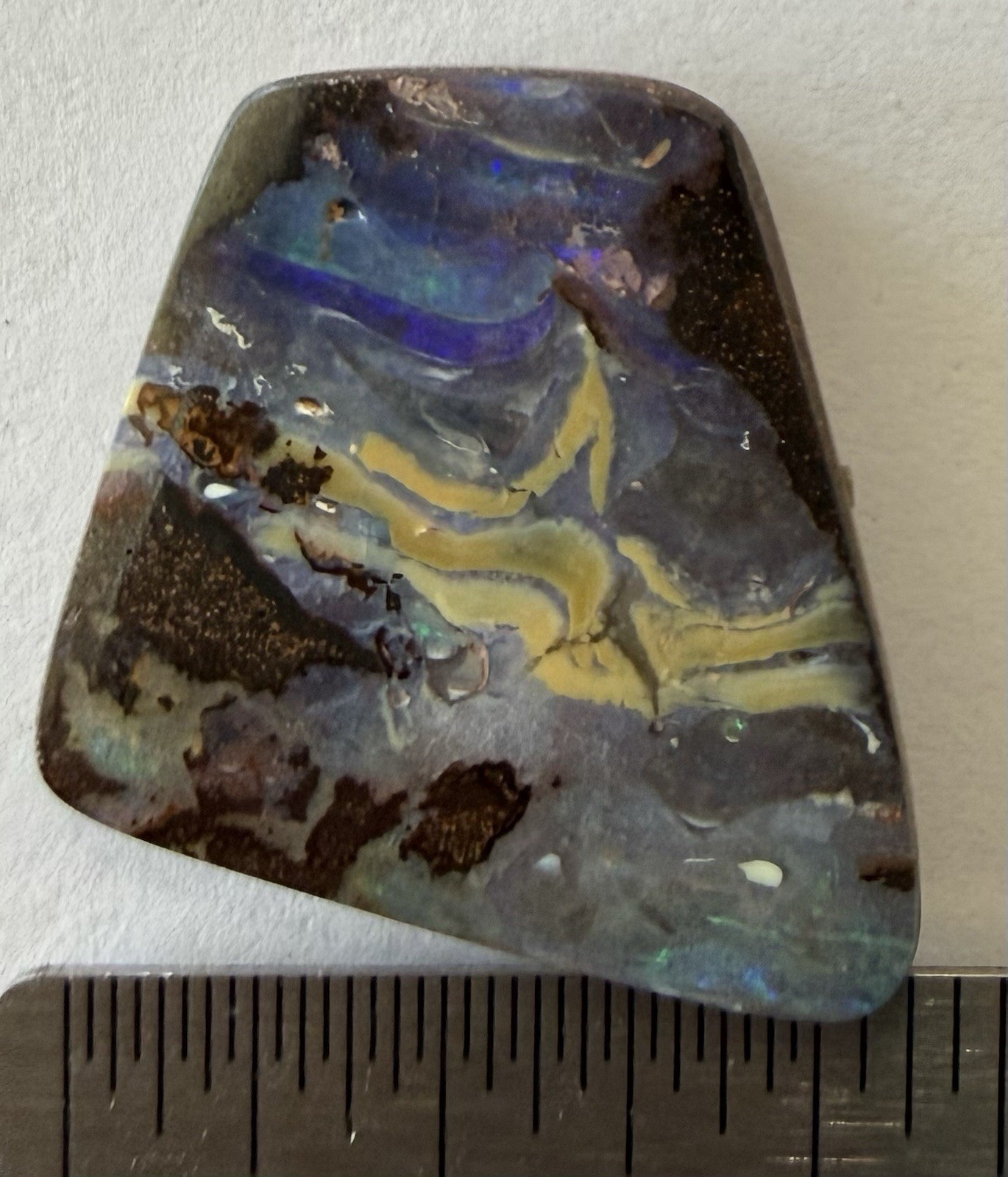 Australian Boulder Opal Cabochon. 1 3/8”x 1 5/16”x 1/8”, 0.3 oz. Polished front
