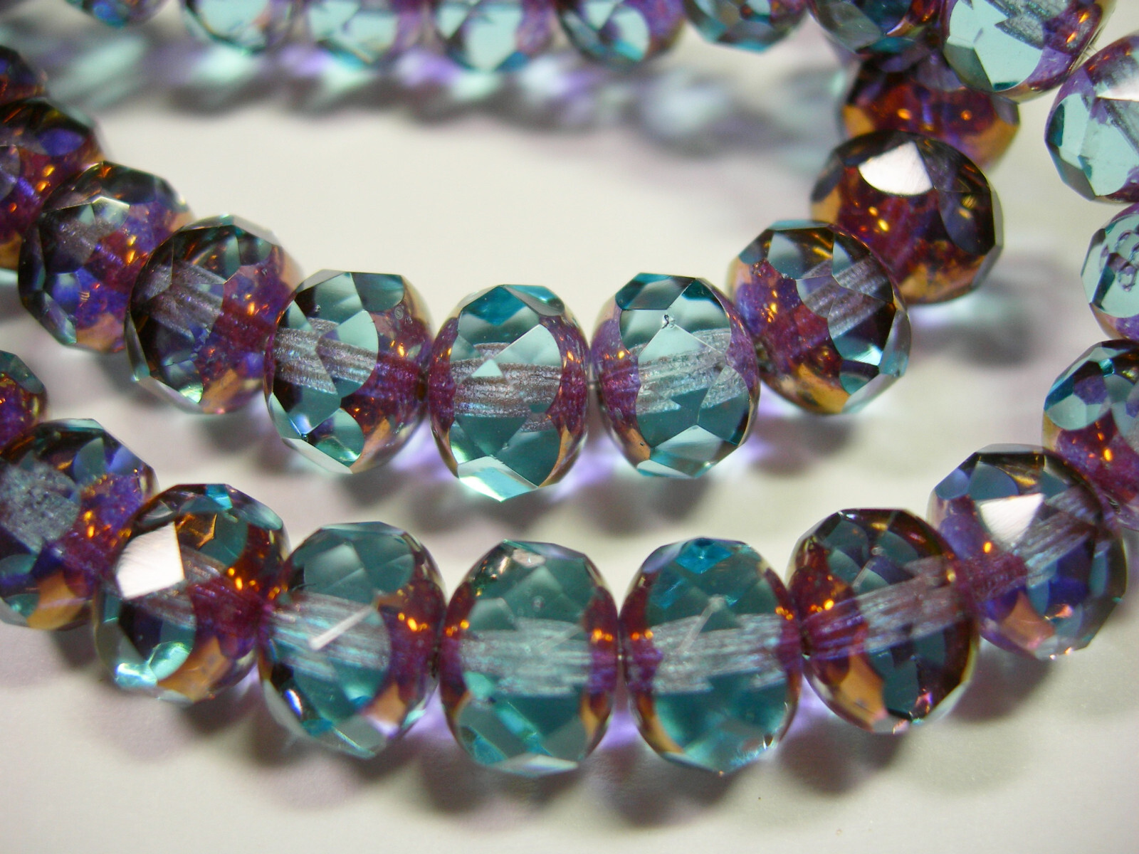 25 8x6mm Sapphire Blue with Bronze Czech Fire polished Rondelle beads