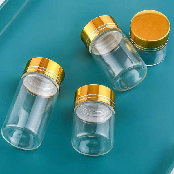 Bulk Buy Empty 5ml-200ml Clear Glass Jar Bottles With Aluminum Gold Line Caps AP